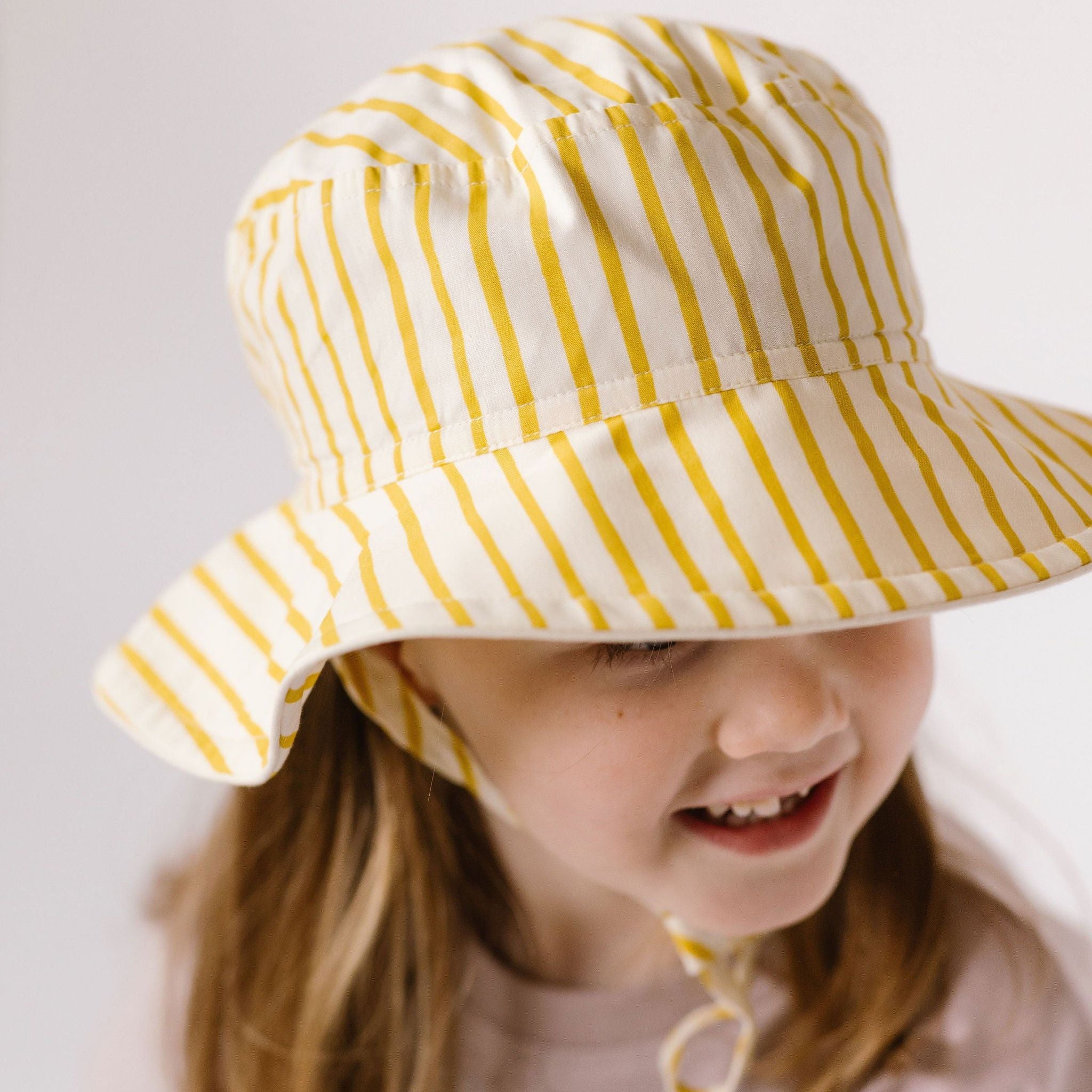 bucket hat stripes away marigold