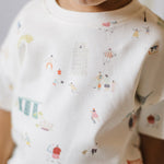 dropped shoulder short sleeve t shirt explore the world